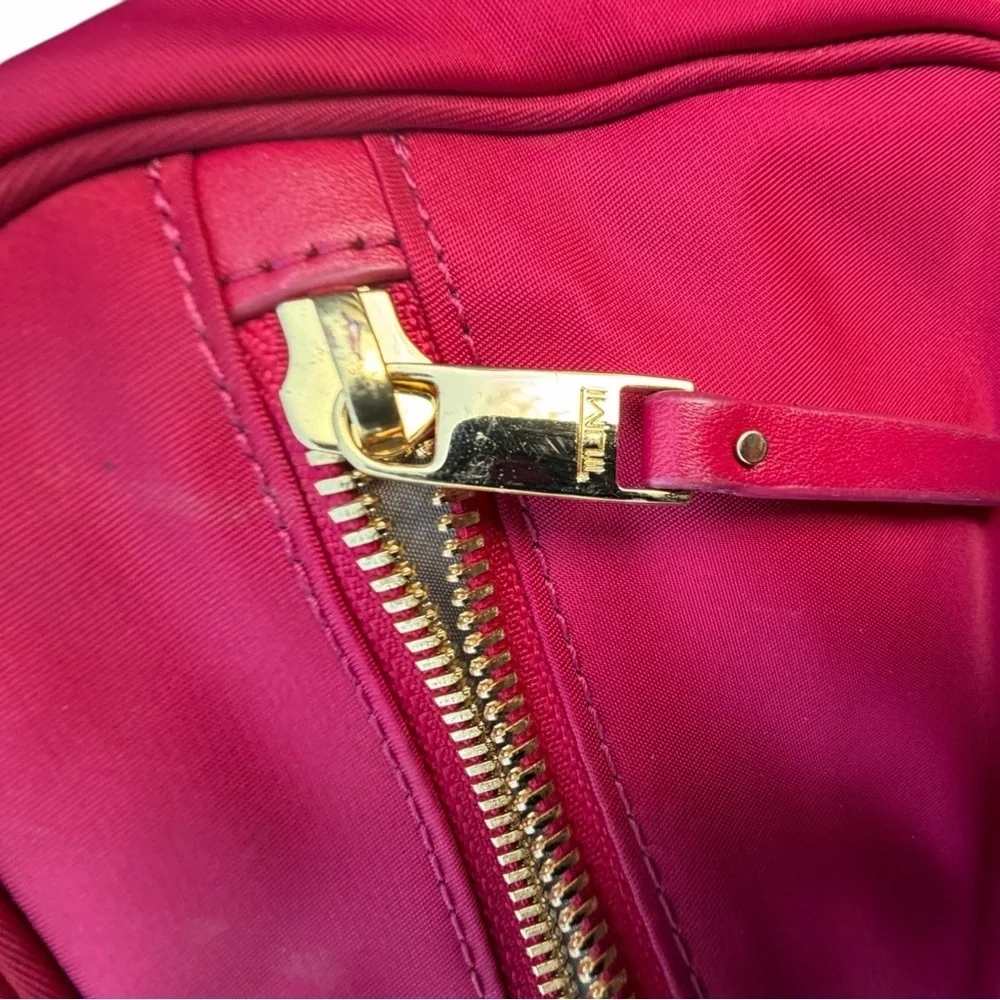 Tumi pink hanging